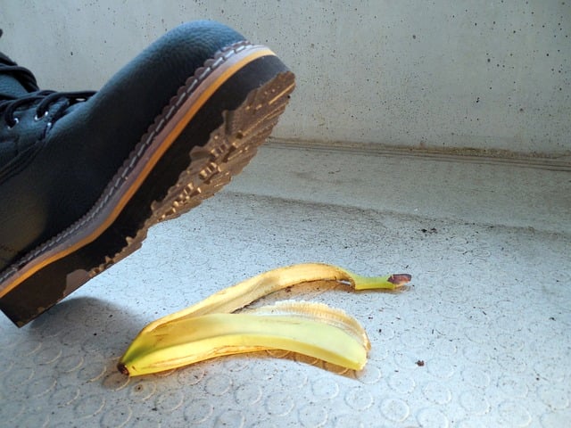 Shoe stepping on banana peel