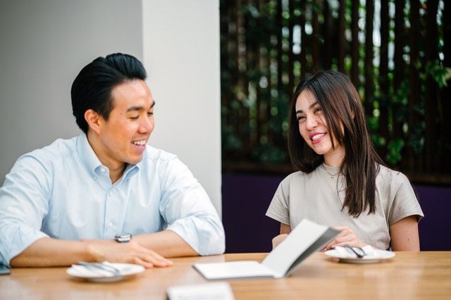 man and woman sitting