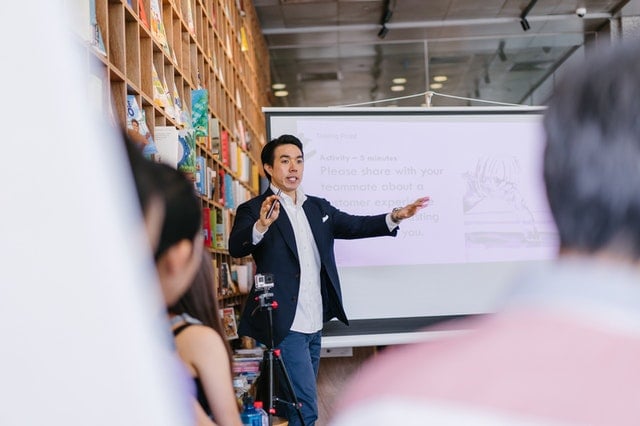 man giving talk