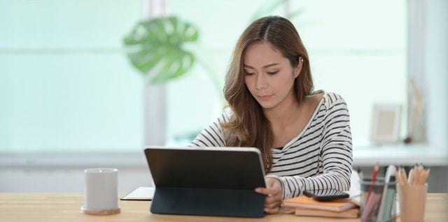 Woman using laptop